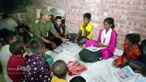 আদিবাসী শিশুদের মাঝে শিক্ষার আলো ছড়িয়ে দিচ্ছেন বিরলের আনসার কমান্ডার